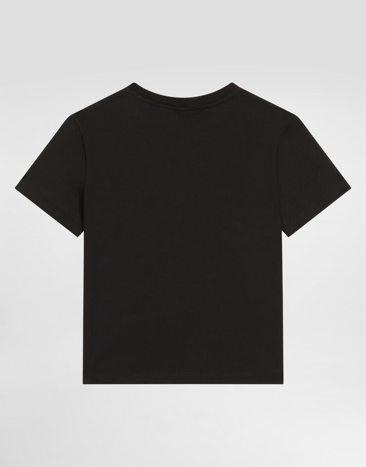 Dolce & Gabbana T-shirt in jersey con logo DG in termostrass Dolce & Gabbana T-shirt in jersey con logo DG in termostrass Nero L5JTOXG7PMB