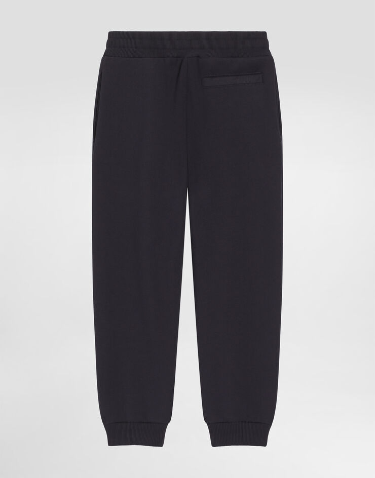 Dolce & Gabbana Fleece trousers with patch Blue L4JPIGG7PMH
