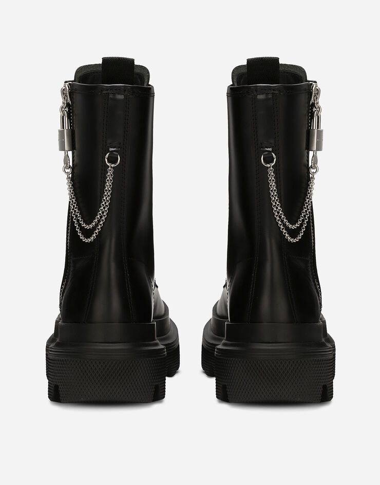 Dolce & Gabbana حذاء بوت برقبة للكاحل من جلد عجل أسود CT1025AB640