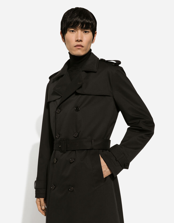 Dolce & Gabbana Zweireihiger Trenchcoat aus Nylon Schwarz G042RTFUS0D