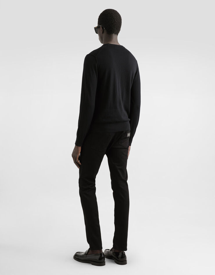 Dolce & Gabbana Maglia girocollo in cashmere con dettaglio gioiello Nero GXX02ZJBW05
