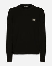 Dolce & Gabbana Wool round-neck sweater with branded tag Black GXX36TJCVS6