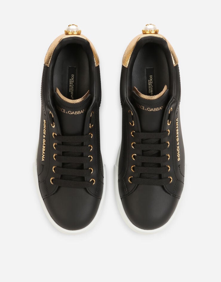 Dolce & Gabbana Sneakers Portofino en cuir de veau nappa à lettering Noir/Doré CK1602AN298