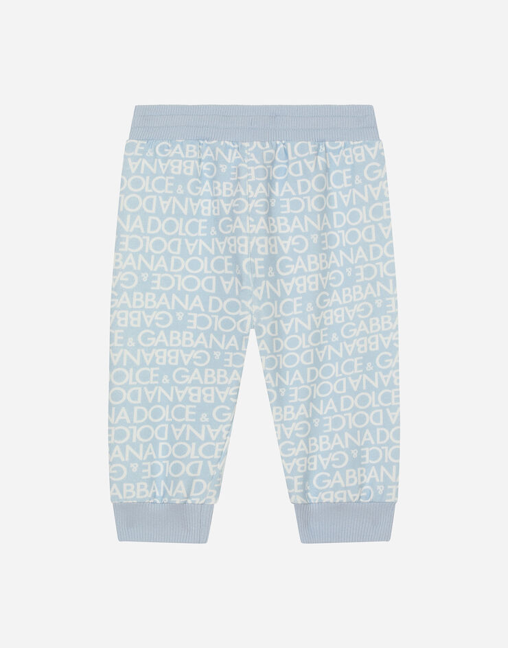 DolceGabbanaSpa Pantalón de chándal en punto con estampado Logomania Azul Claro L1JPIBG7KR1