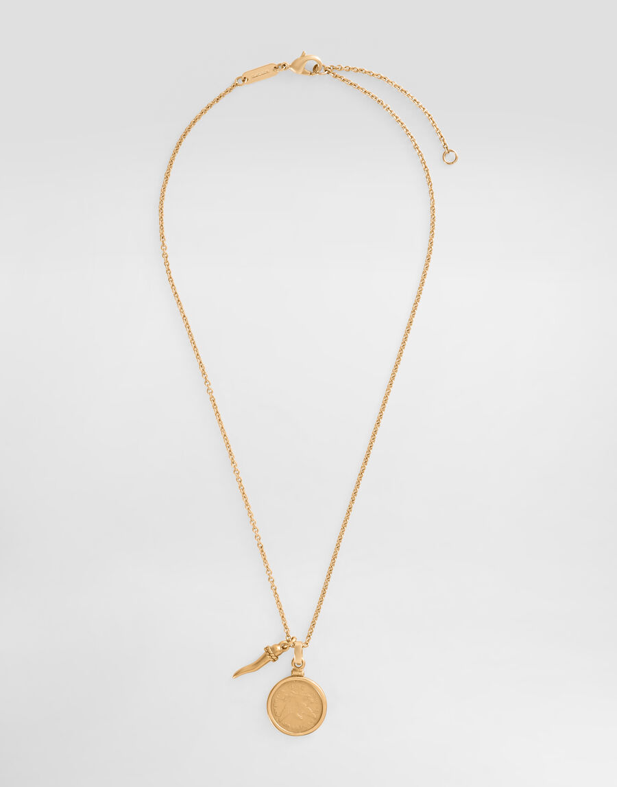 Necklace with medal and horn