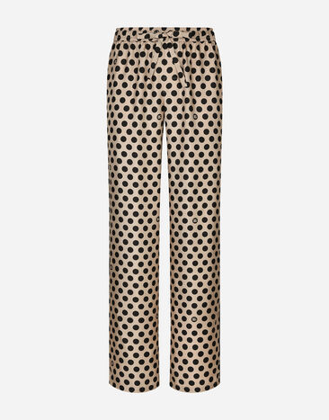 Dolce & Gabbana Silk jogging pants with polka-dot print and DG logo Multicolor CS1769AJ968