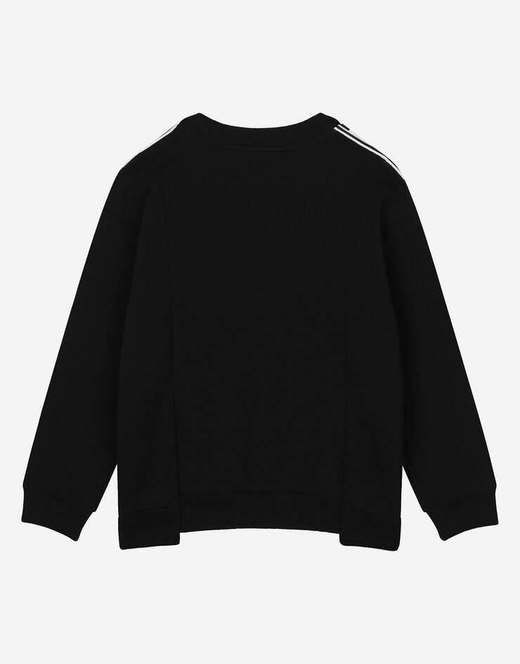 DolceGabbanaSpa Long-sleeved round-neck sweatshirt with logo print and branded trims Black L4JWIRG7KK0