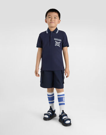 Dolce & Gabbana Piqué polo-shirt with DG logo Blue L4JTIIG7O0B