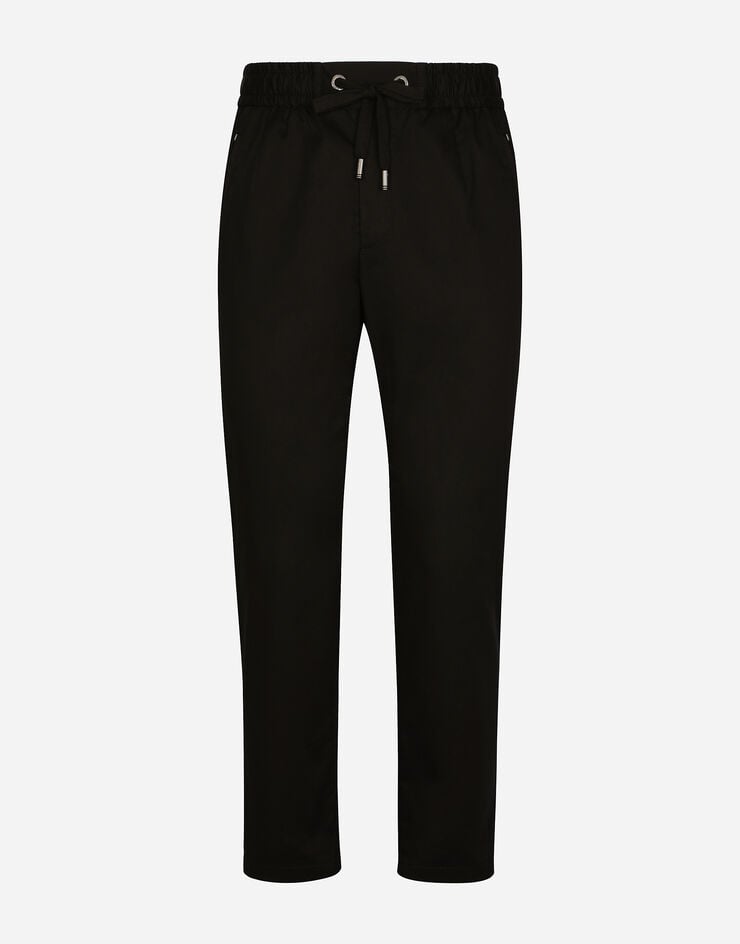 Dolce & Gabbana Pantalón de chándal de algodón elástico con placa Negro GVZAETFUFJR