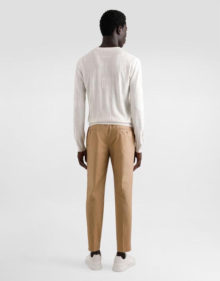Dolce & Gabbana Pull ras de cou en soie avec logo DG brodé all-over Blanc GXX02TJBSK5
