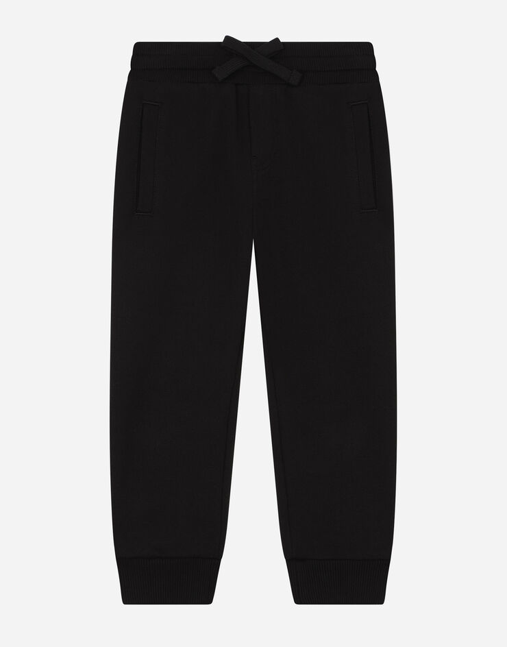 Dolce & Gabbana Pantalones de chándal de punto con placa logotipo Negro L4JPT0G7OLJ