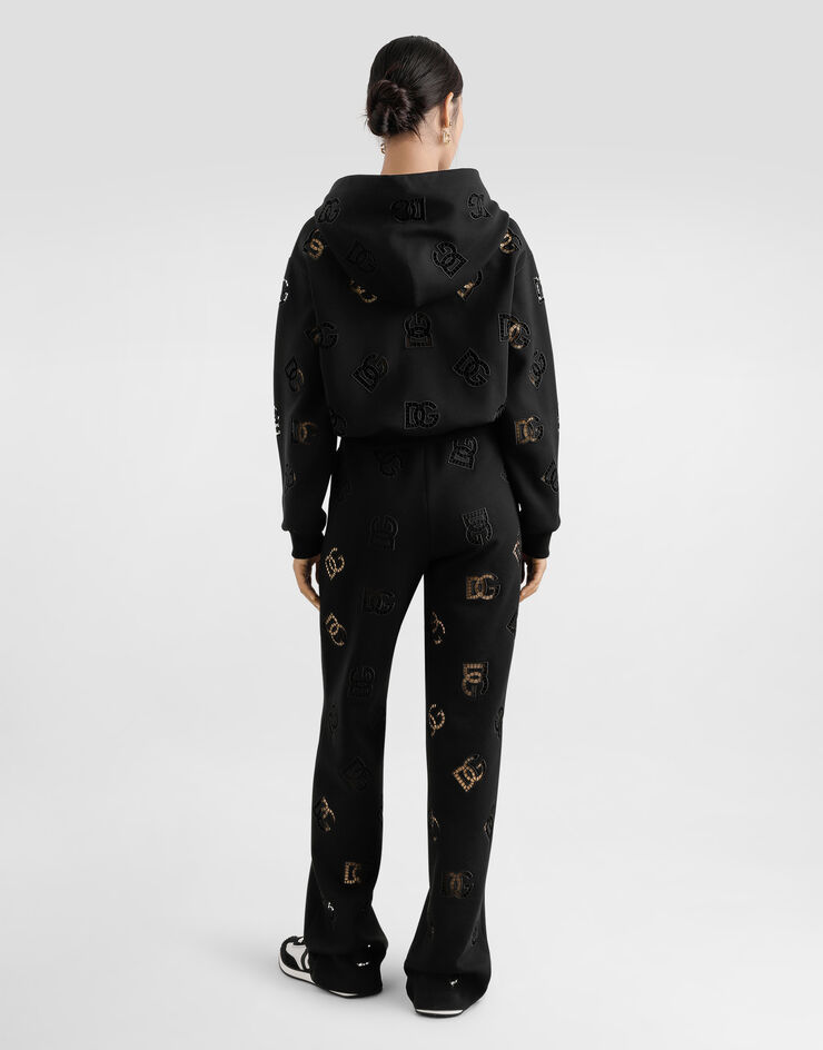Dolce & Gabbana Sweatshirt aus Jersey mit Cut-out-Stickerei DG-Logo Schwarz F9P36ZGDB9T
