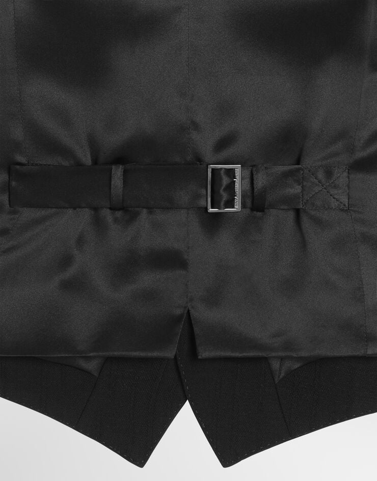 Dolce & Gabbana Chaleco de botonadura simple en jacquard de lana con motivo de rayas Negro G702UTFR22A