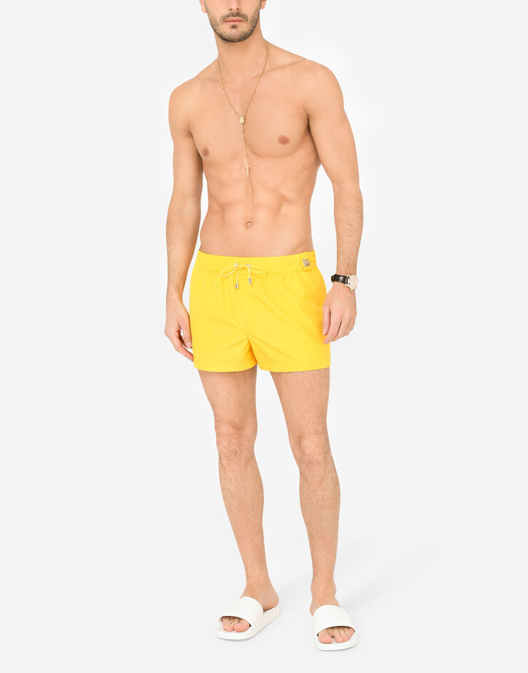 Dolce & Gabbana Short swim trunks with metal DG logo Orange M4B39TFUSFW