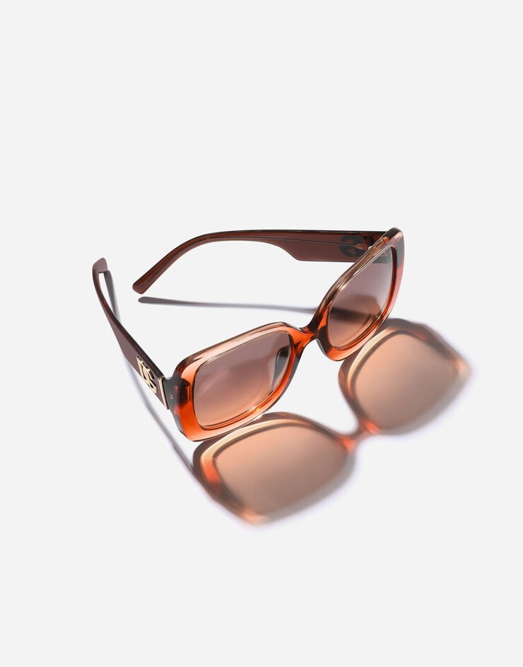 Dolce & Gabbana Lunettes de soleil à motif Maiolica Arancione Dolce & Gabbana Lunettes de soleil à motif Maiolica Arancione Transparent gradient orange VG4513VP078