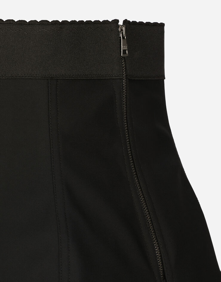 Dolce & Gabbana تنورة قصيرة دانتيل وماركيزيت مع تفاصيل الكورسيه أسود F4AMWTG9752