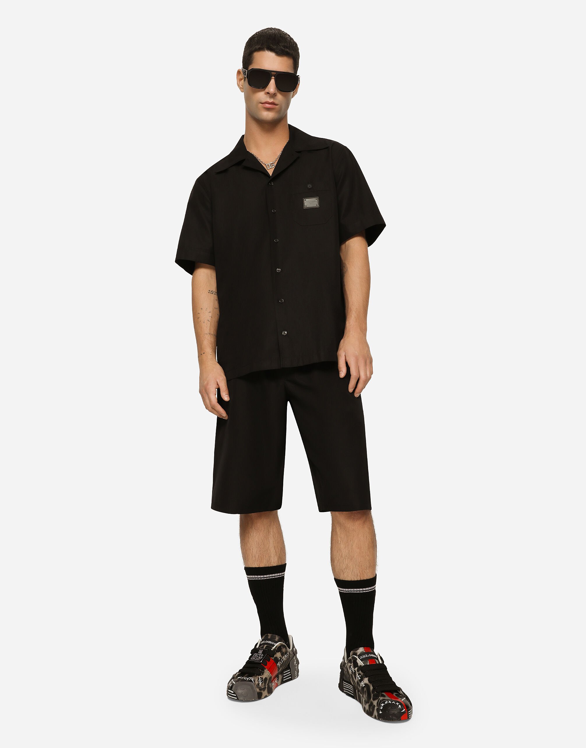 Cotton jogging shorts with logo tag in Black for Men | Dolce&Gabbana® US