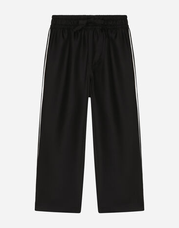 Dolce & Gabbana Pantalón tipo pijama en sarga de seda con DG bordado Negro L43P44G7H8Z