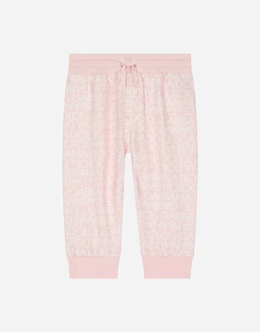 Dolce & Gabbana Jersey jogging pants with all-over logo print Beige L13Q08FUFJR