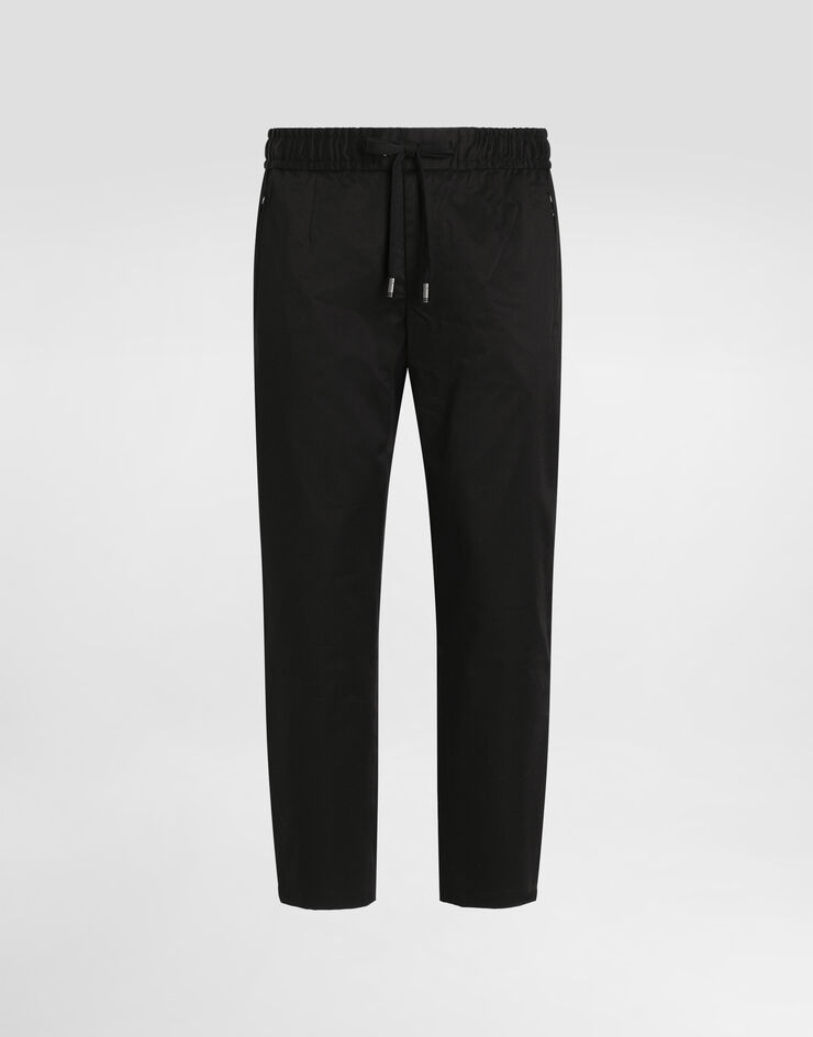 Dolce & Gabbana Jogginghose Baumwollstretch mit Plakette Schwarz GVZAETFUFJR
