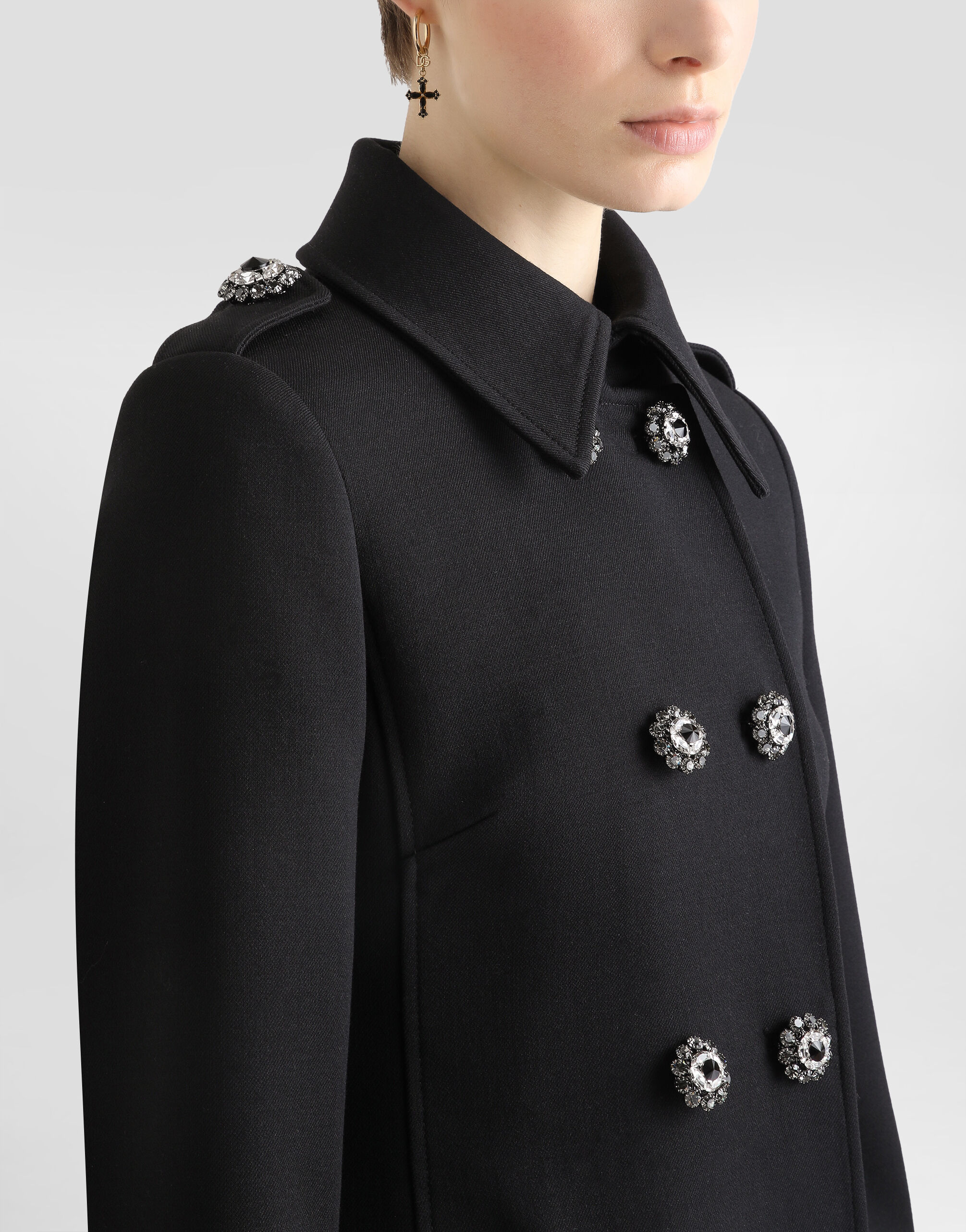 Double-breasted wool coat with bejeweled buttons in Black for