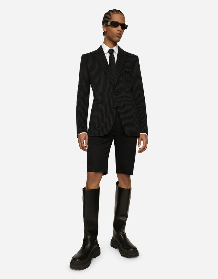 Dolce & Gabbana Bermudas de algodón elástico con parche DG Negro GWRREZGG869