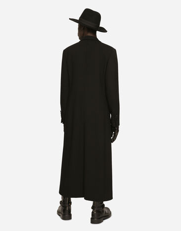 Dolce & Gabbana Zweireihiger Mantel aus Wollkrepp mit Stretchanteil Schwarz G040LTFUBCI