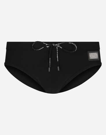 Dolce & Gabbana Slip de bain montant avec plaquette à logo Bleu M4A76JONO05