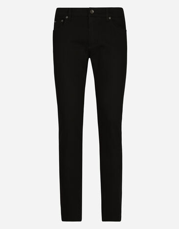 Dolce & Gabbana جينز مرن أسود مغسول بقصة ضيقة أسود VG6184VN187
