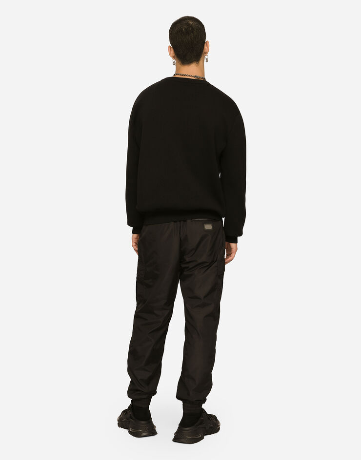Dolce & Gabbana Maglia girocollo lana tecnica con ricamo Nero GXN47ZJEMJ3