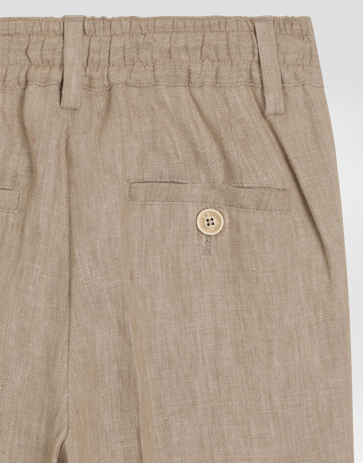 Dolce & Gabbana Twill pants with patch Beige L44P73FU4L0