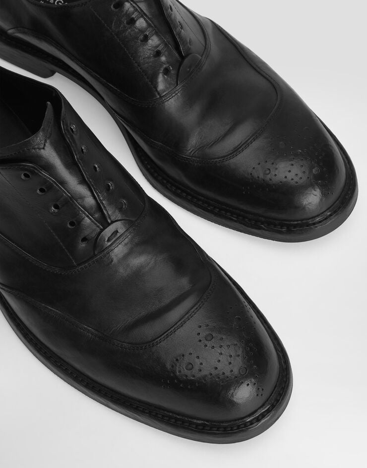Dolce & Gabbana Washed calfskin laced shoes Black A20206A0096