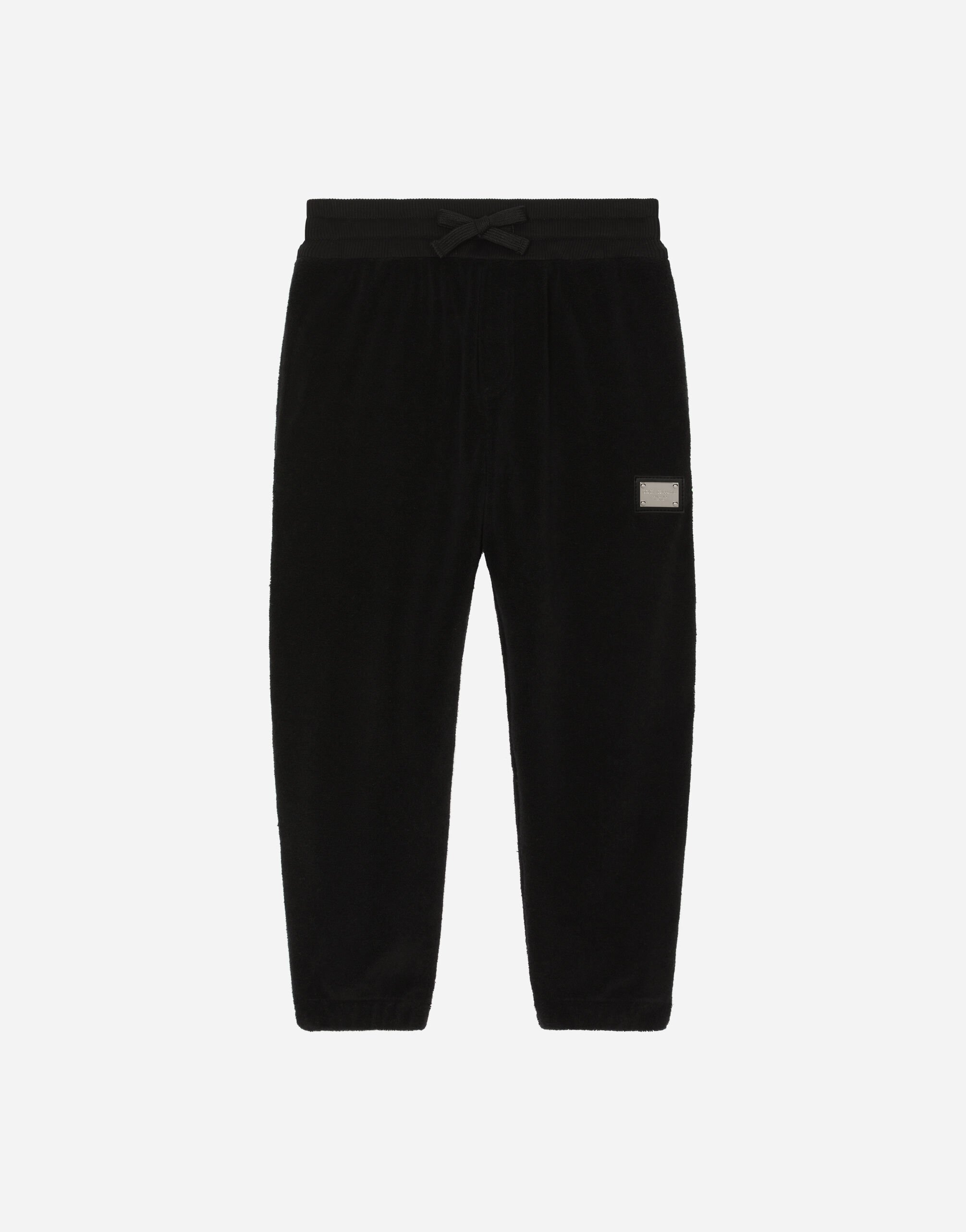 Dolce & Gabbana Terrycloth jogging pants with logo tag Negro L42Q37LDC28