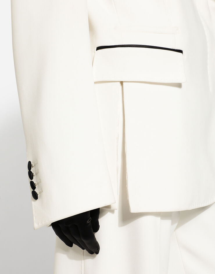 Dolce&Gabbana Zweireihige Jacke aus Wollkrepp mit Smokingkragen Weiss F29XKTFURF3