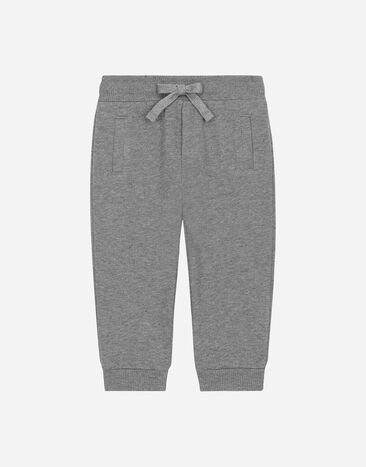 Dolce & Gabbana Jersey jogging pants with logo tag Beige L13Q08FUFJR