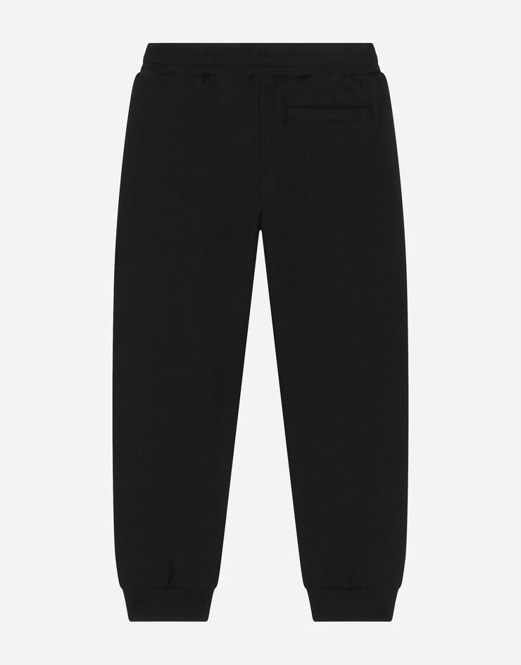 Dolce&Gabbana Pantalone jogging in jersey con logo floccato Black L4JPFEG7K2C