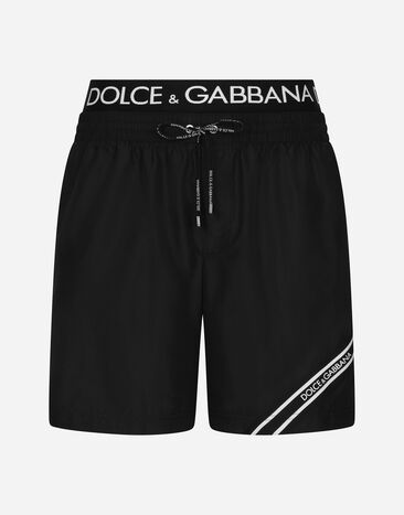 Dolce & Gabbana Mittellange Badeshorts mit Logostreifen Print M4E68TISMF5