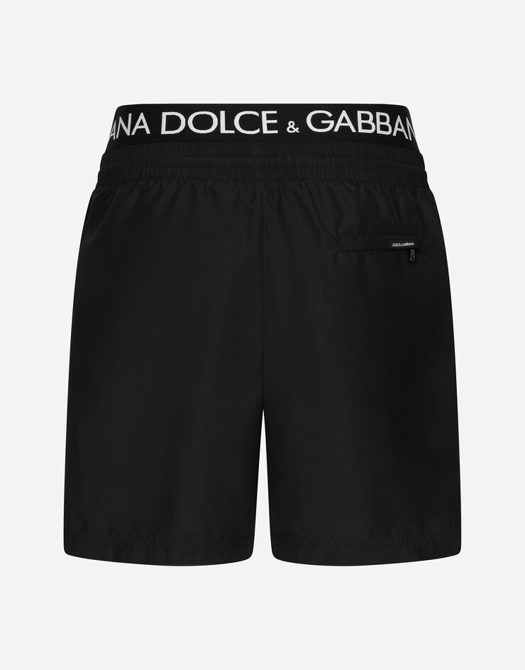 Dolce & Gabbana Mittellange Badeshorts mit Logostreifen Schwarz M4E71TFUSFW