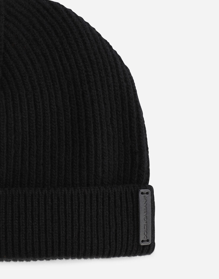 Dolce & Gabbana Strickmütze aus Wolle Lederlogo Schwarz GXE84TJAV99