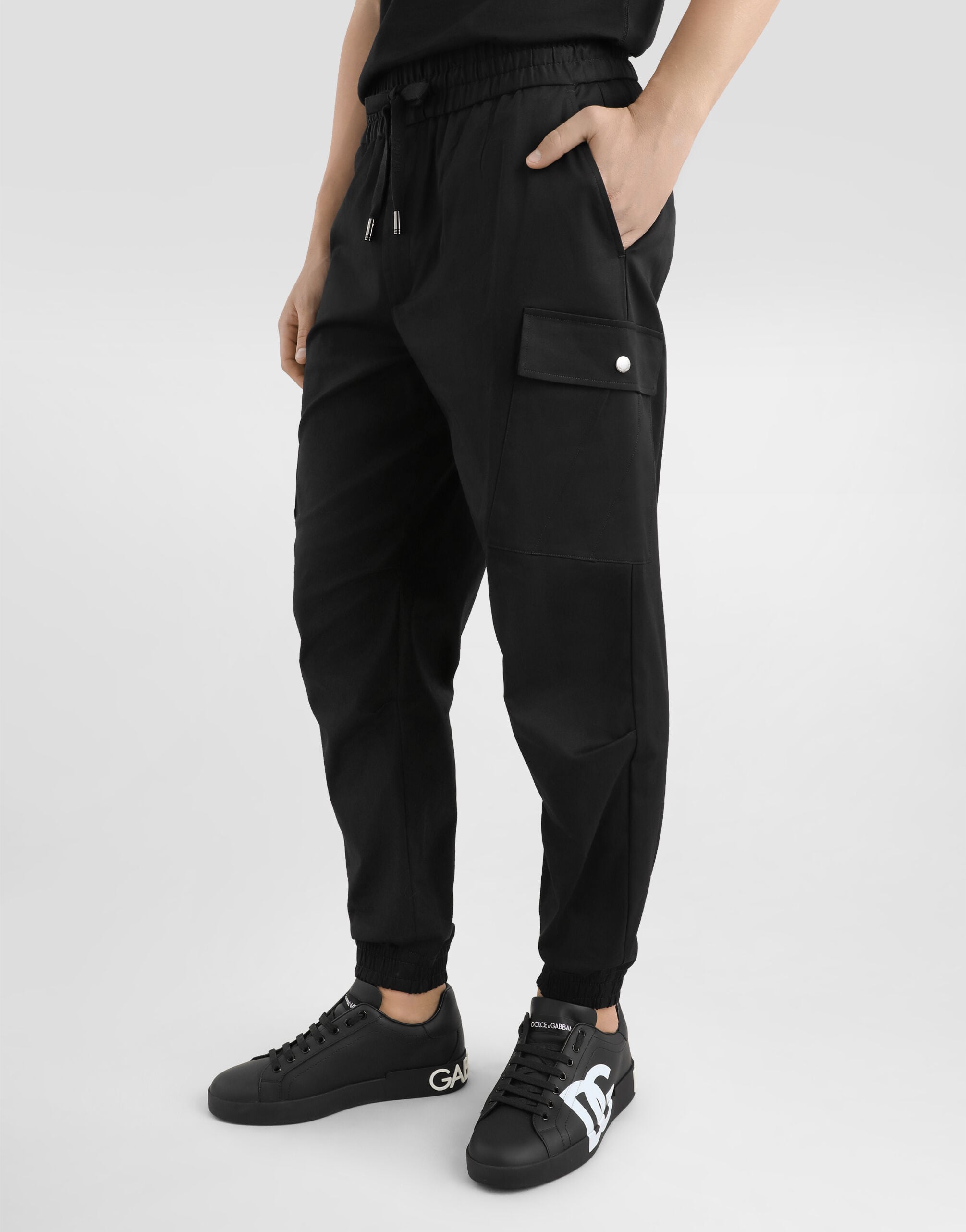 Cotton cargo pants with branded tag in Black for Men | Dolce&Gabbana®