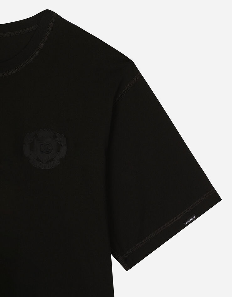 Dolce & Gabbana T-Shirt aus Baumwolle mit Logostickerei Schwarz G8PN9ZG7NYJ