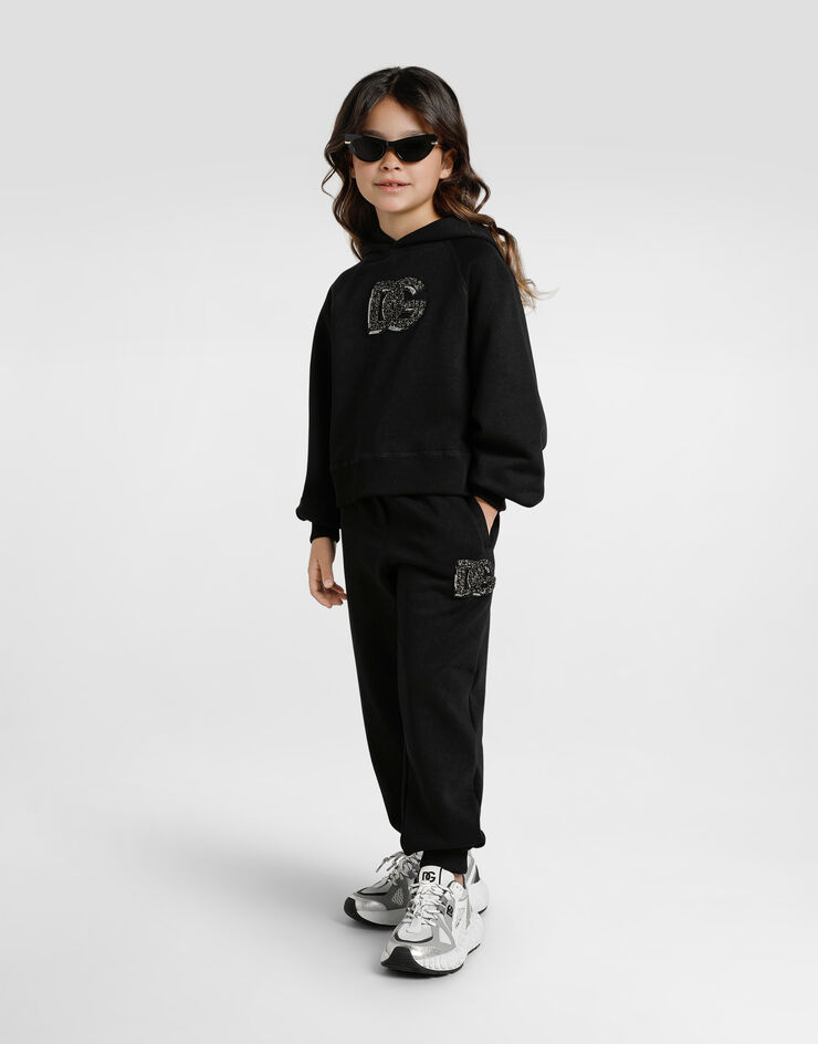 Dolce & Gabbana Oversized hooded sweatshirt with logo and rhinestones Black L5JWCBG7PHM