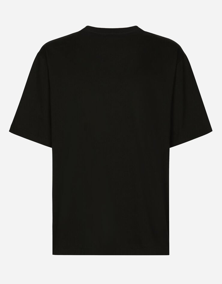 Dolce & Gabbana Camiseta de cuello redondo en algodón con parche DG Negro G8PD7ZG7G6Q