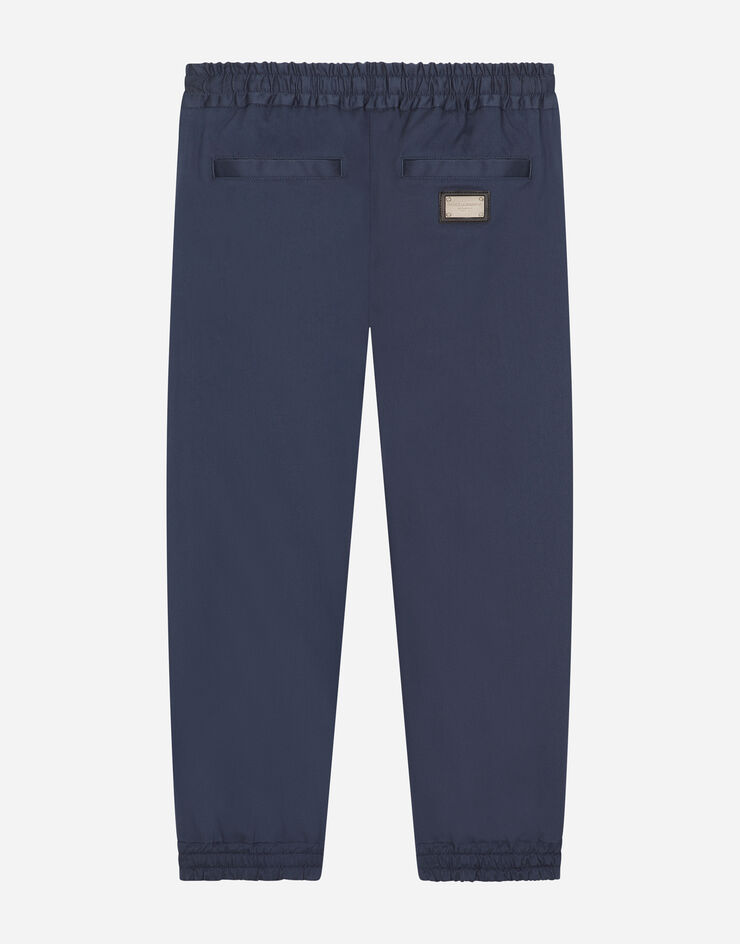 Dolce & Gabbana Stretch gabardine pants with logo tag Azul L44P32G7M4D