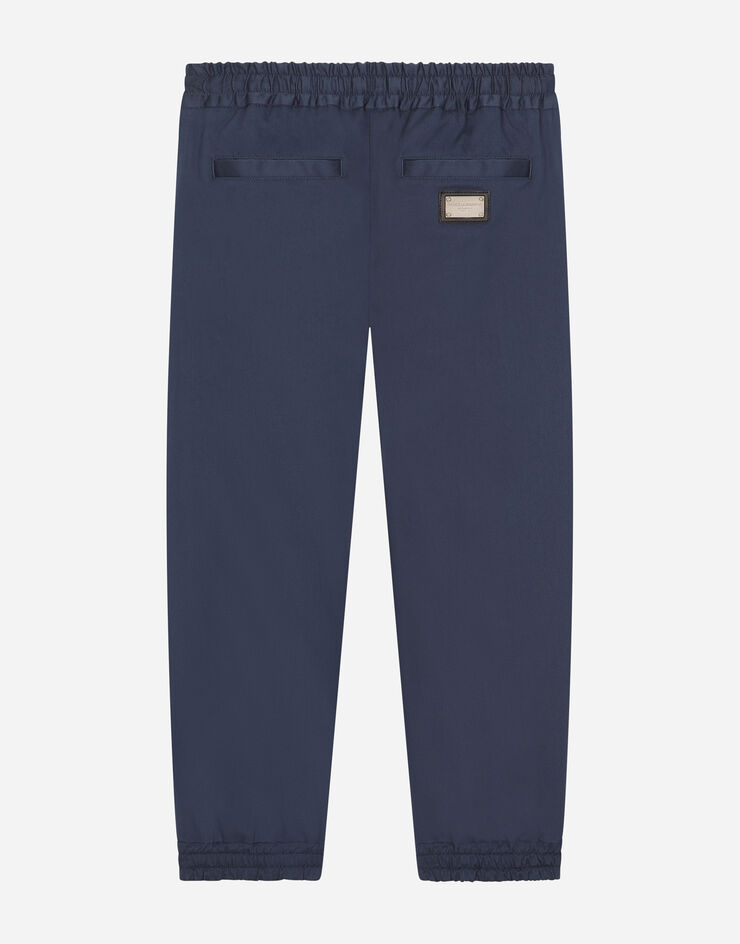 Dolce & Gabbana Pantalón de gabardina elástica con placa con logotipo Azul L44P32G7M4D