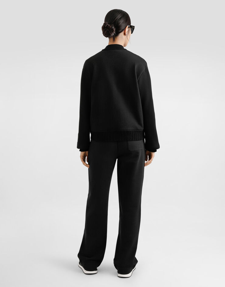 Dolce & Gabbana Pantaloni jogging in jersey con ricamo logo DG  in strass Nero FTC91ZGDCXW