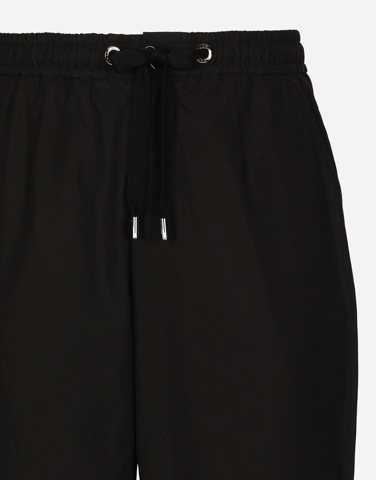 Dolce & Gabbana سروال للركض قطني أسود GP0D4TFU5PY