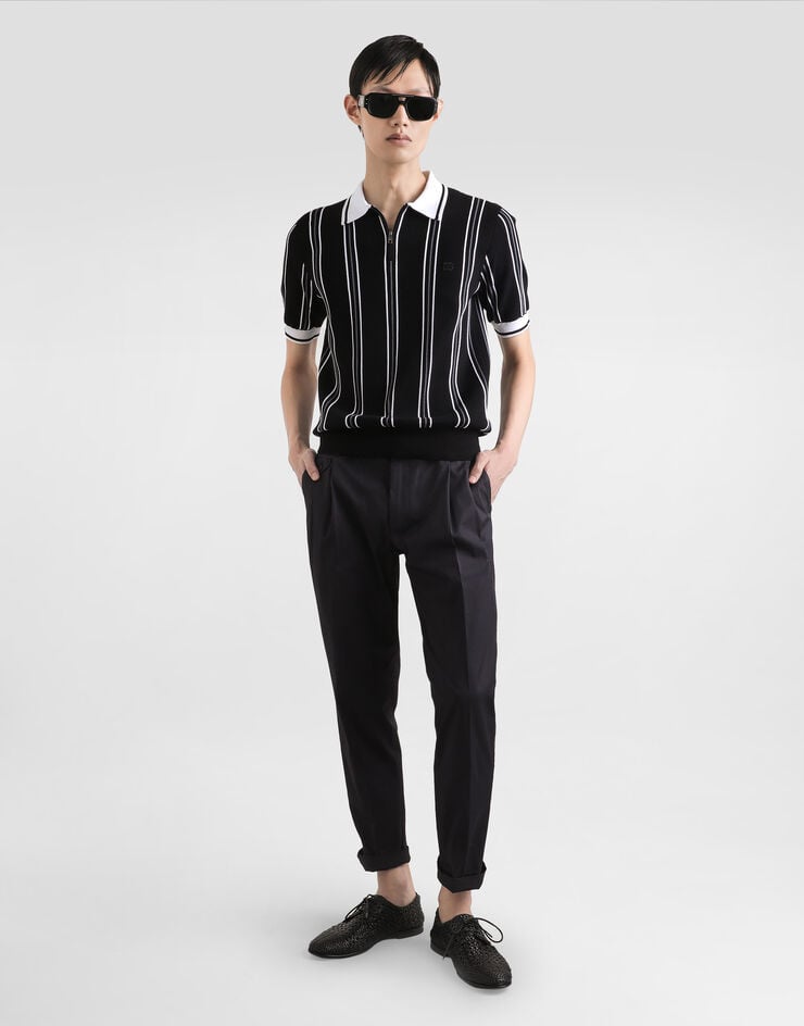 Dolce & Gabbana Poloshirt aus Baumwollstrick mit Intarsie Mehrfarbig GXZ92ZJBCHD