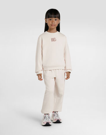 Dolce & Gabbana Oversize-Hose aus Sweatstoff mit DG-Patch aus Pailletten Pink L5JPG9G7PKQ