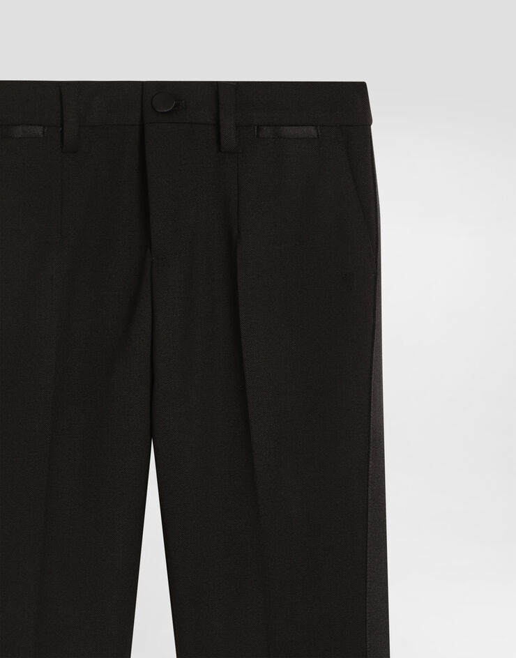 Dolce & Gabbana Pantalón clásico en mezcla de lana y raso duquesa Negro L44P64FUBE7